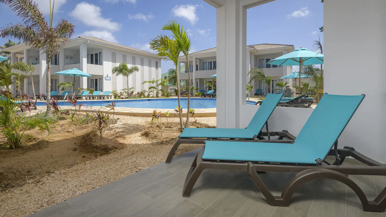 The new wing and loungers by the pool