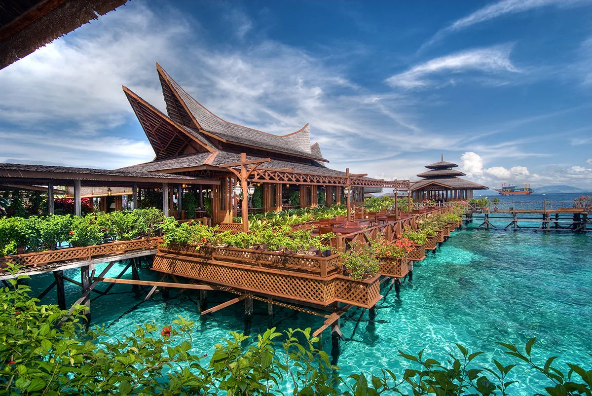 Bungalows on stilts over turquoise water