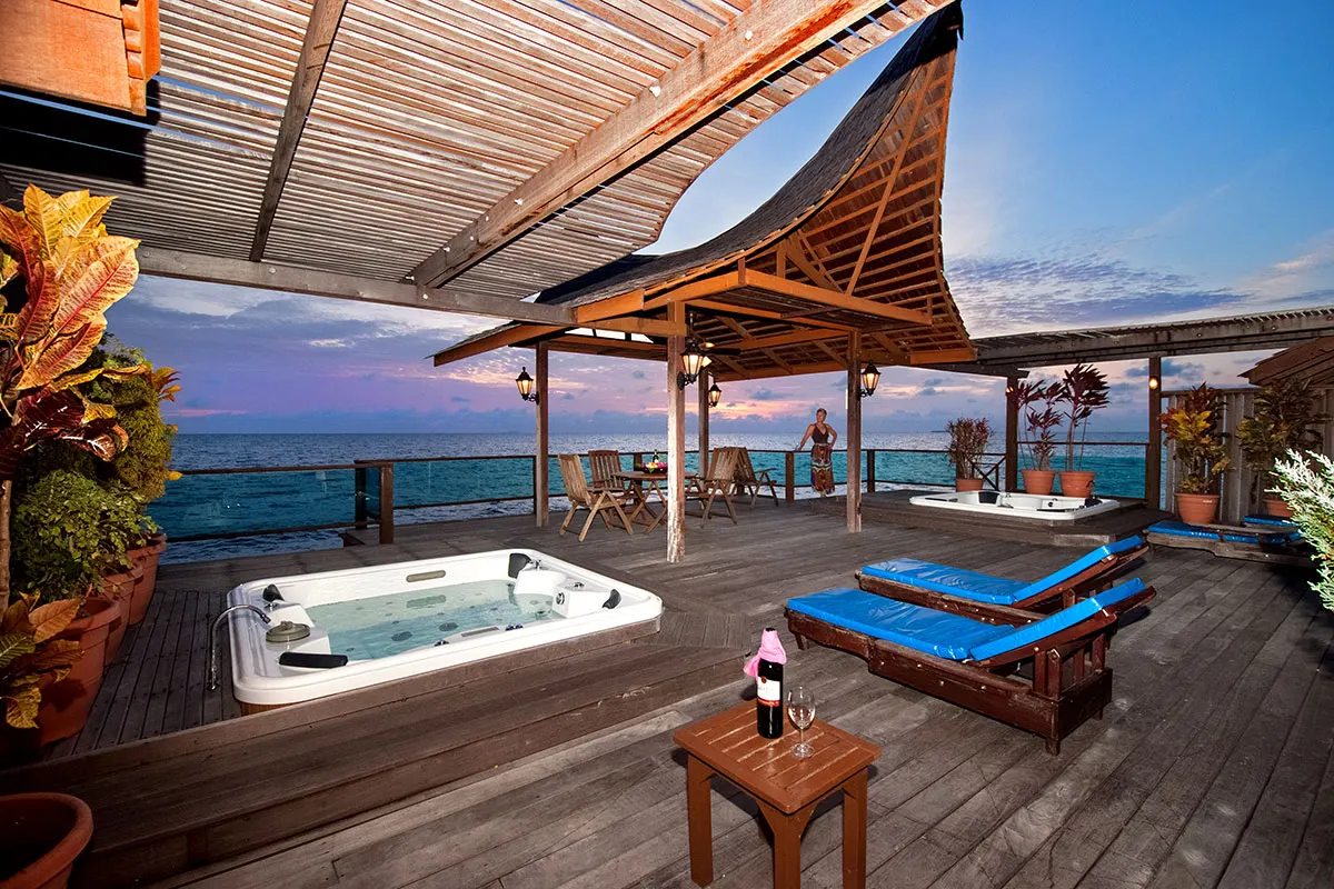 Sundeck with a jacuzzi at sunset