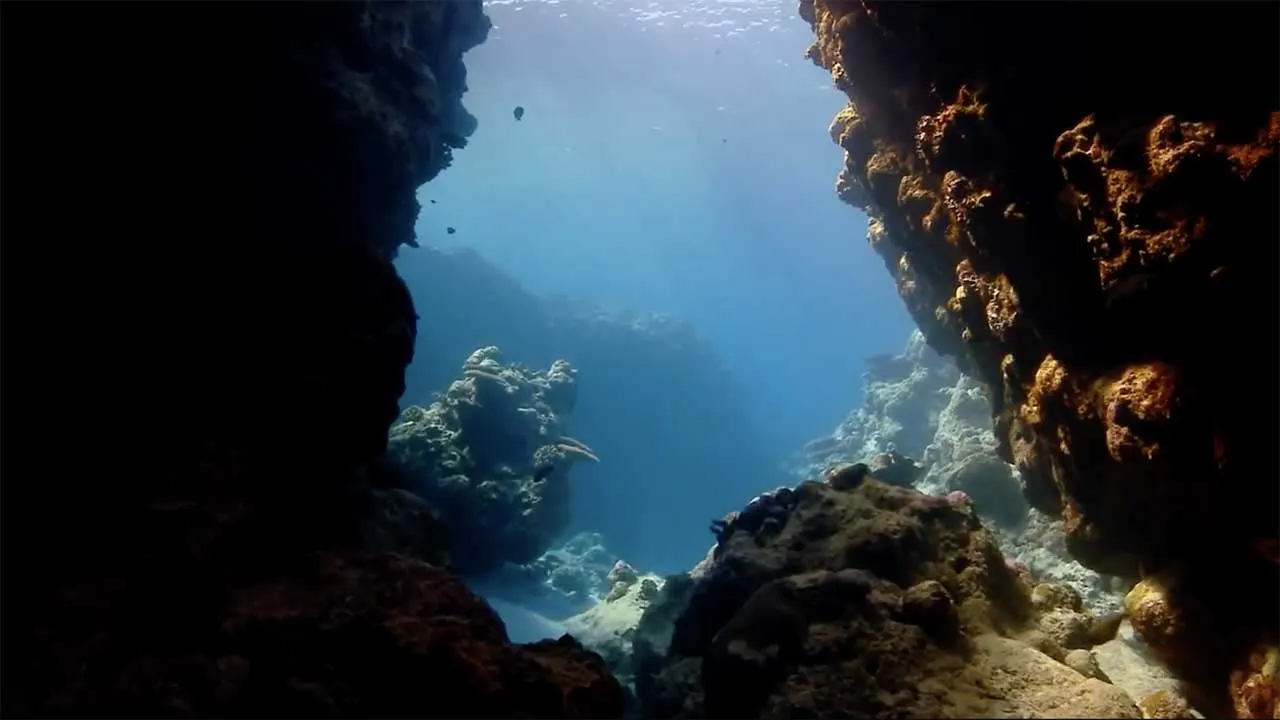 Light through the roof of an underwater cavern