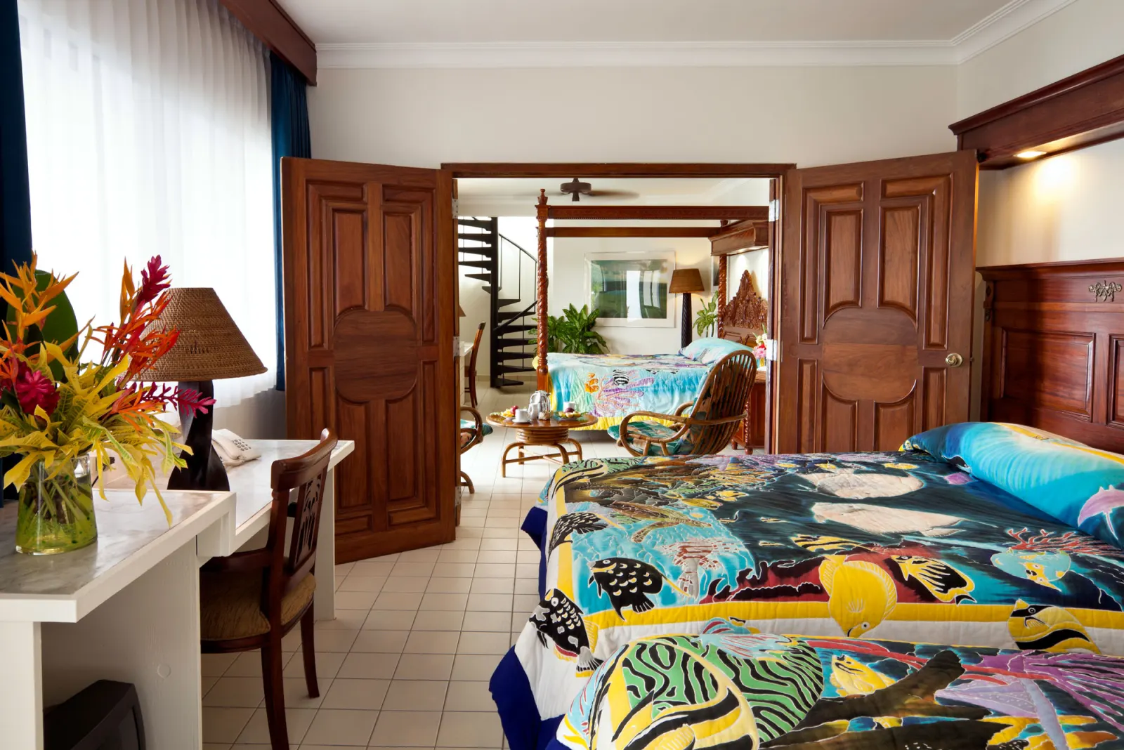A Deluxe Ocean View room with a king bed