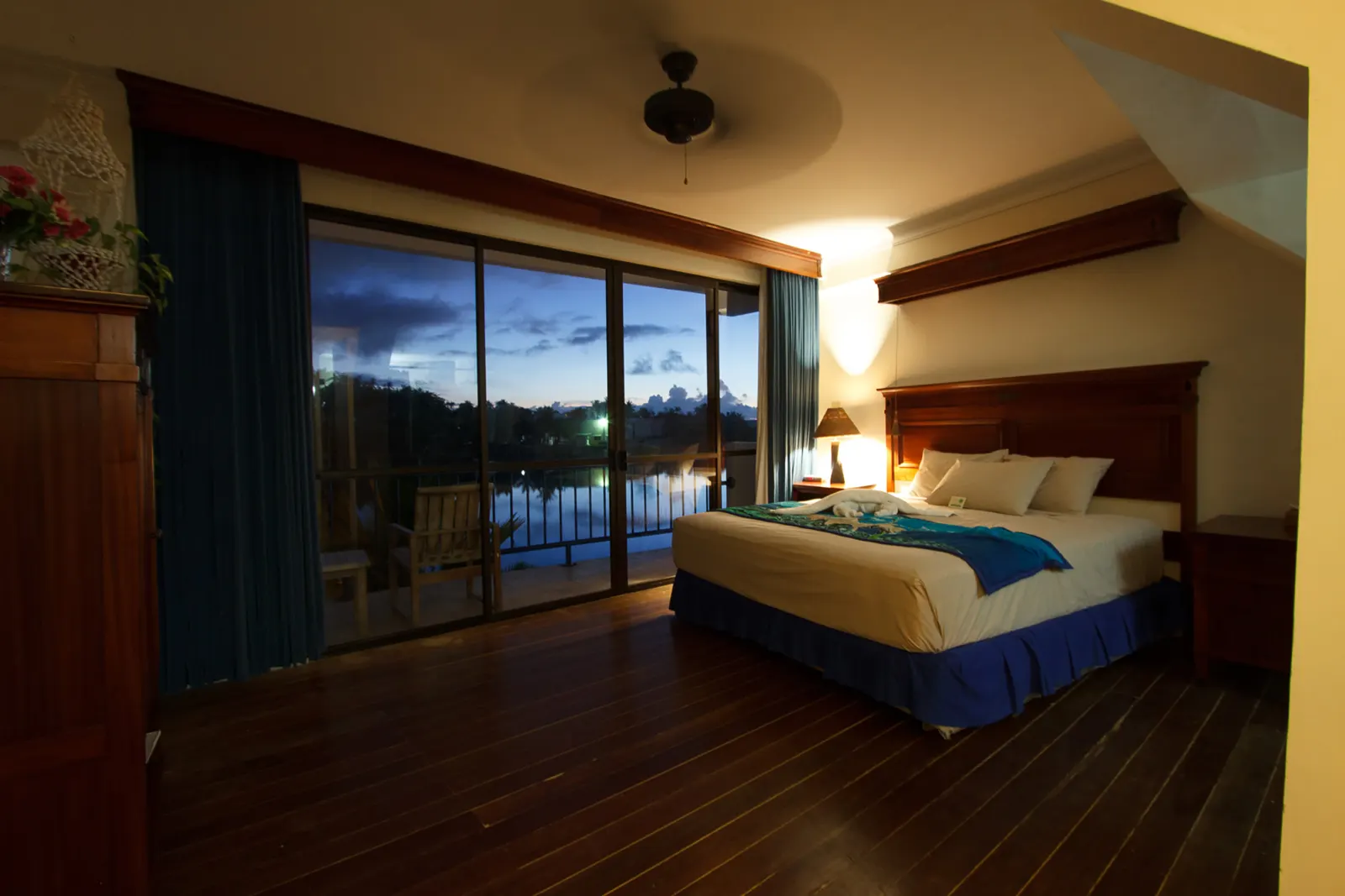 Deluxe Ocean View — window onto the bay at dusk