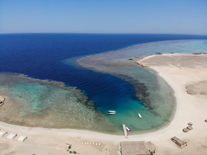 Marsa Nakari bay and the house reef from above