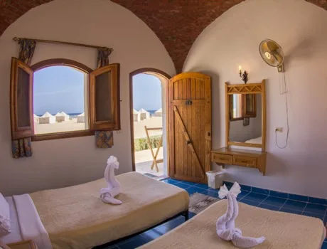 Hut interior with two single beds