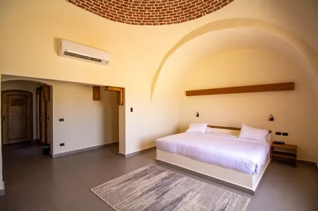 Premium Deluxe chalet bedroom with a vaulted ceiling