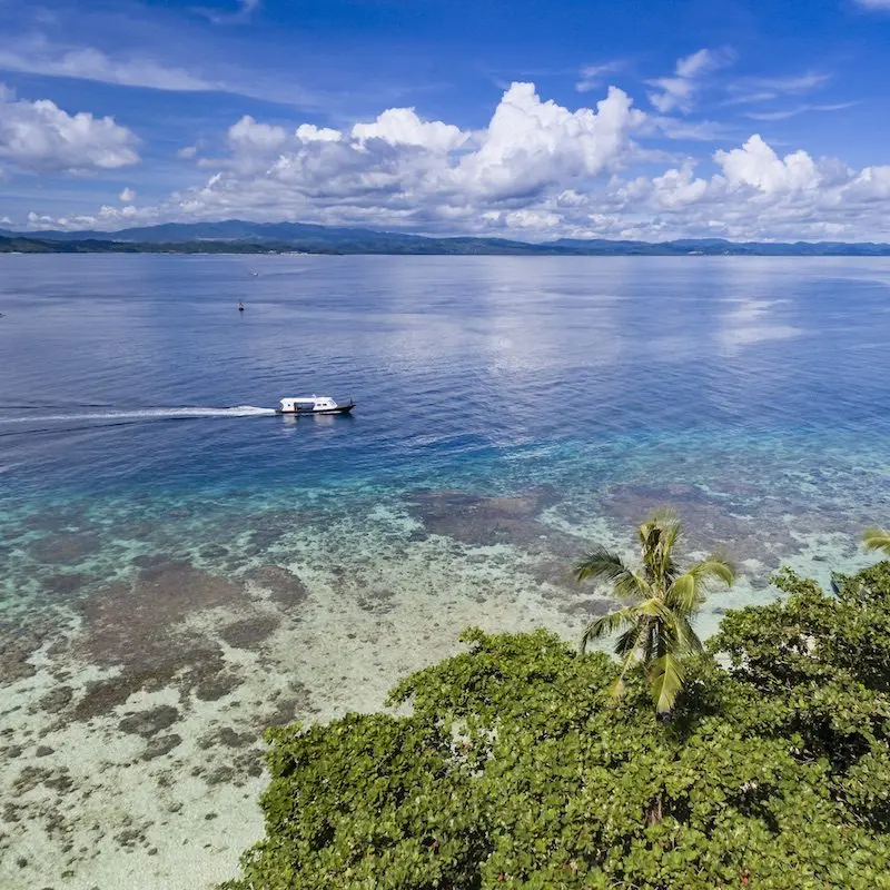 A boat over the reef