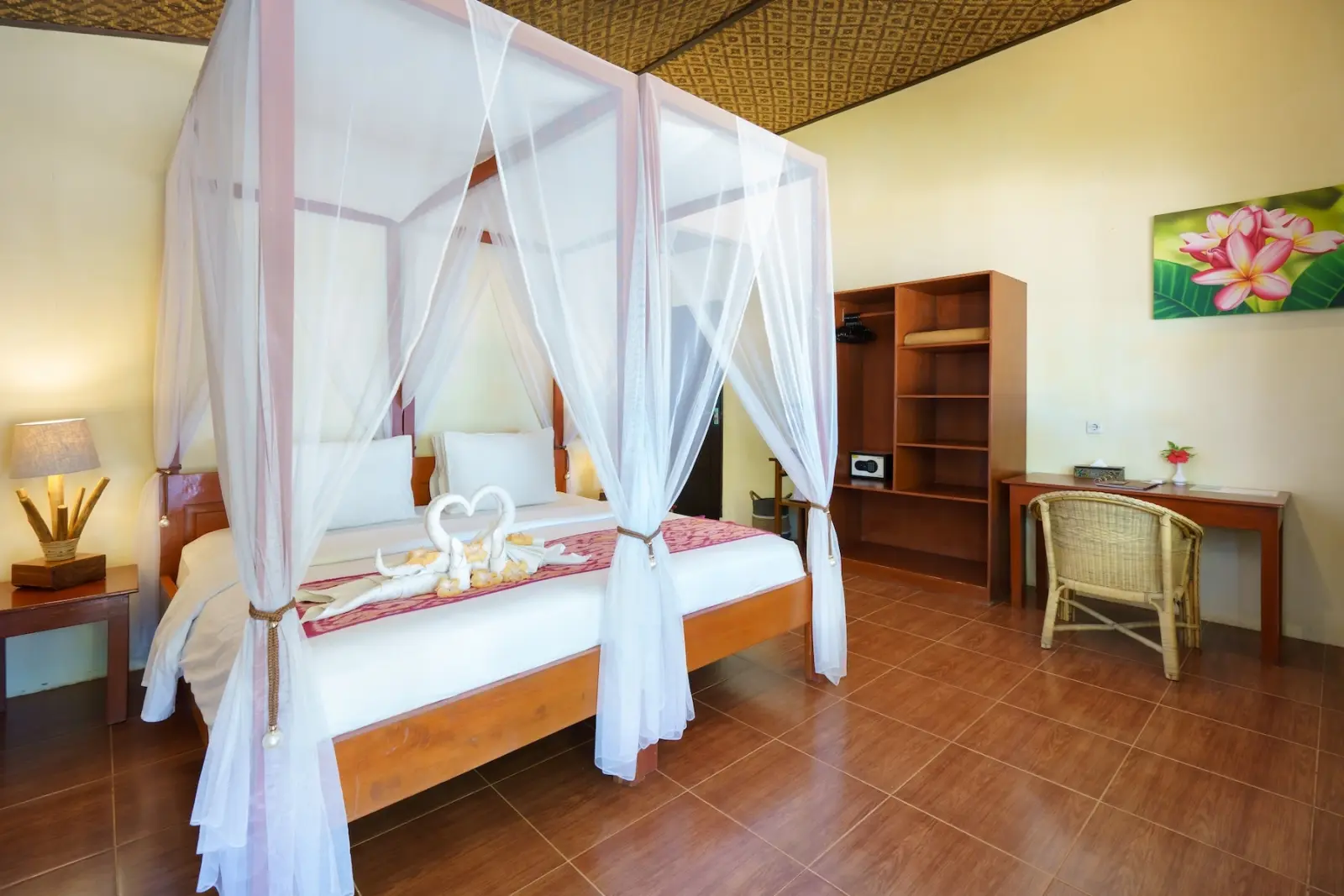 Bedroom with a bed under a mosquito net