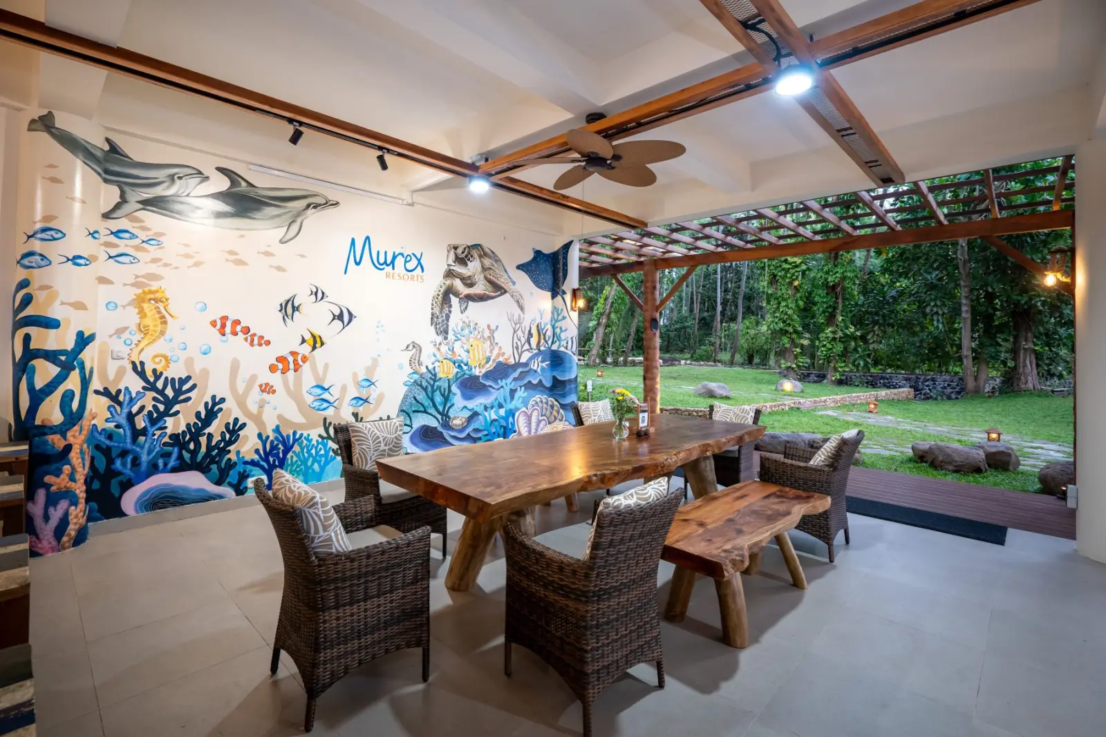 Covered lounge with a mural