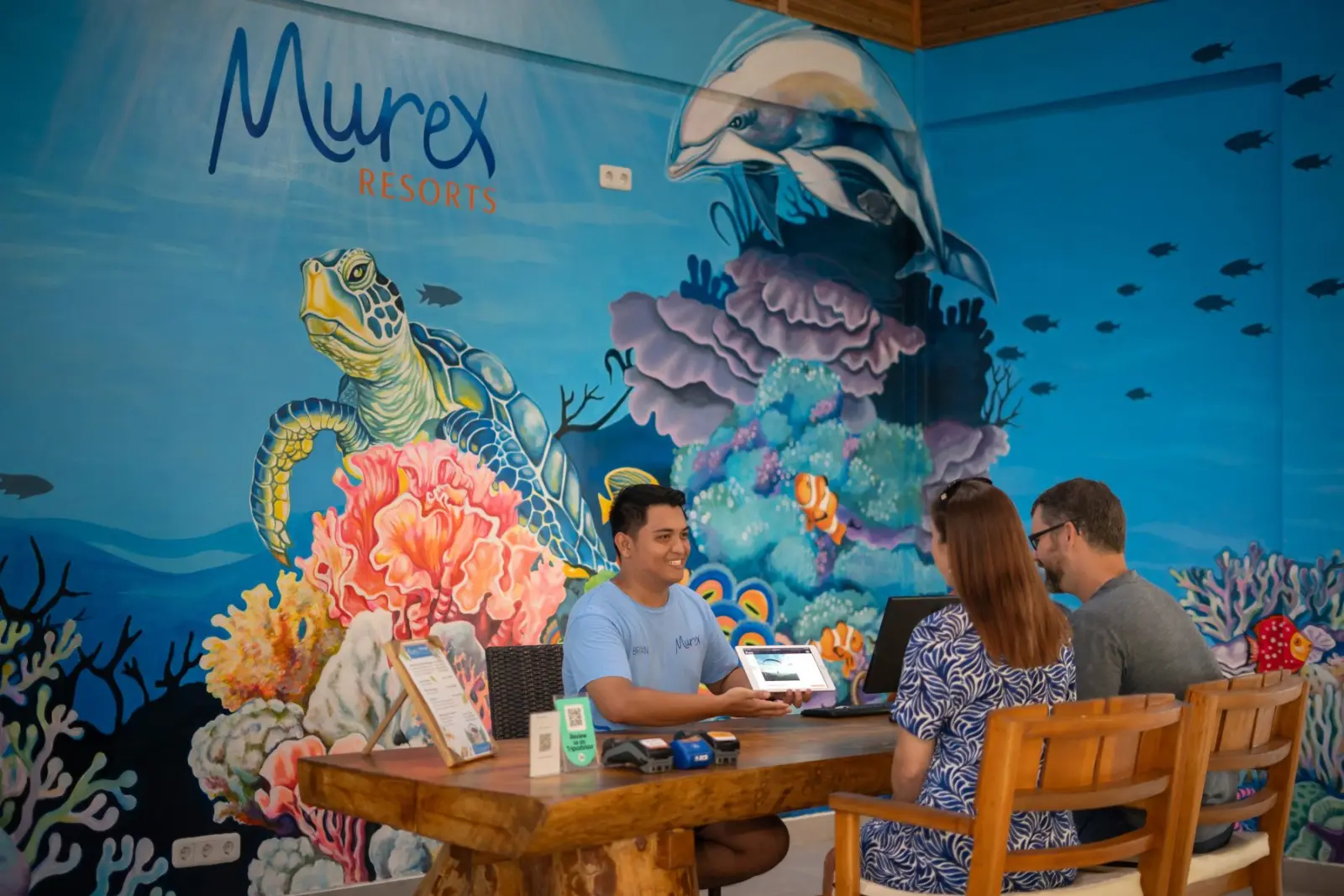 Reception with a marine mural