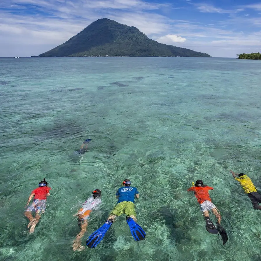 Snorkelling off Manado Tua