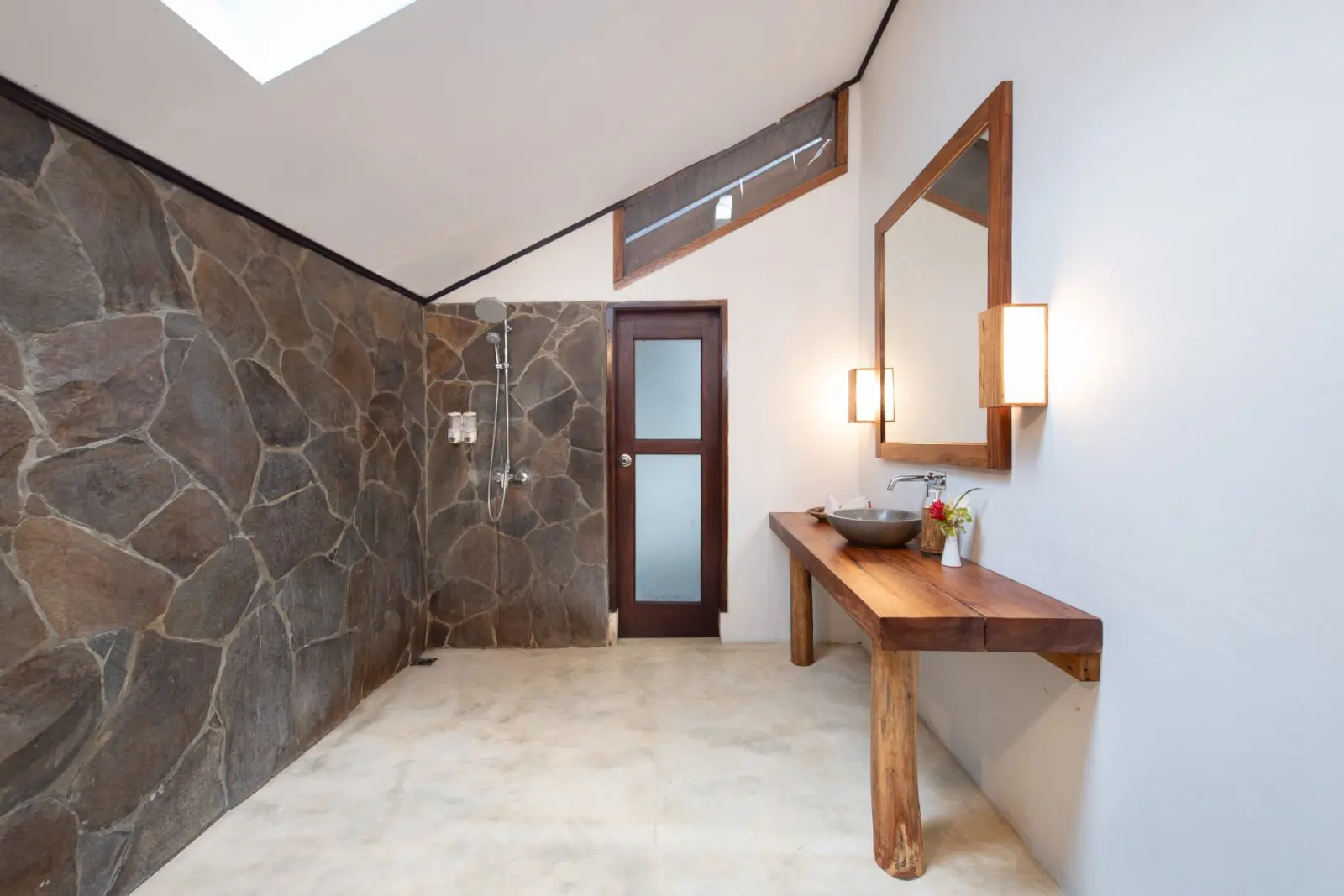 Bathroom with stone walls