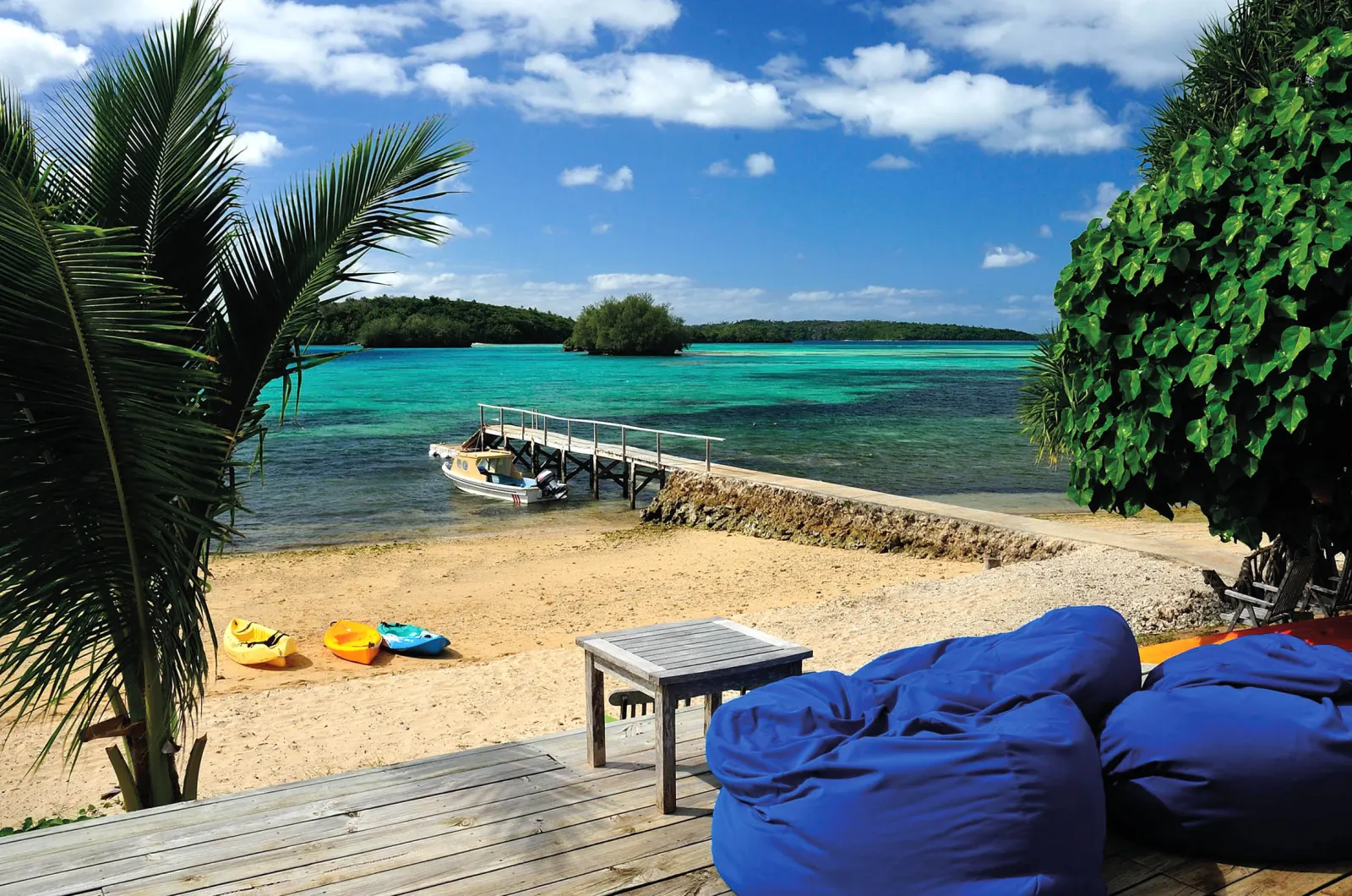 Beach with bean bags and the jetty