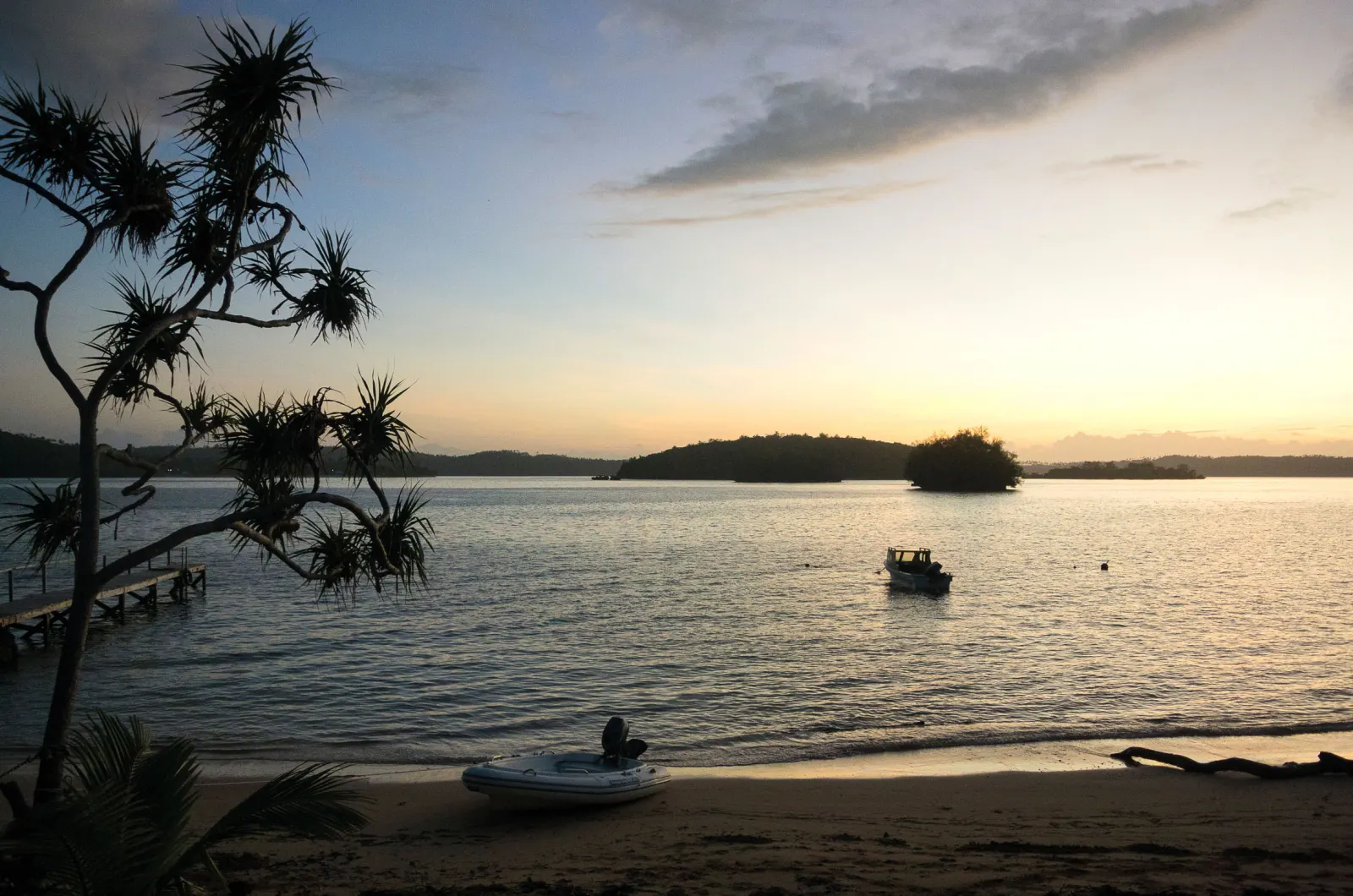 Sunset and a boat on the water