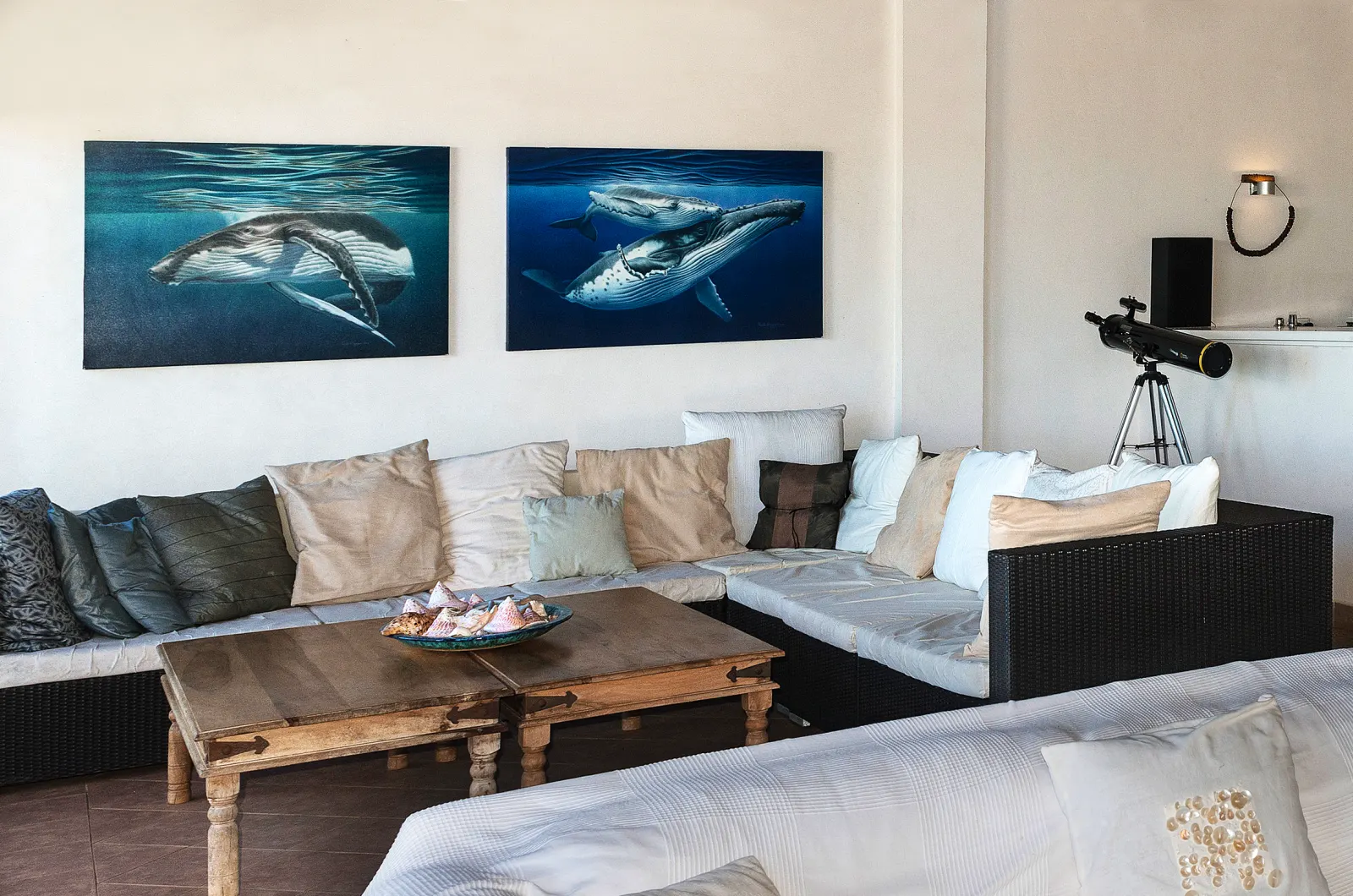 Sitting room with whale prints on the walls