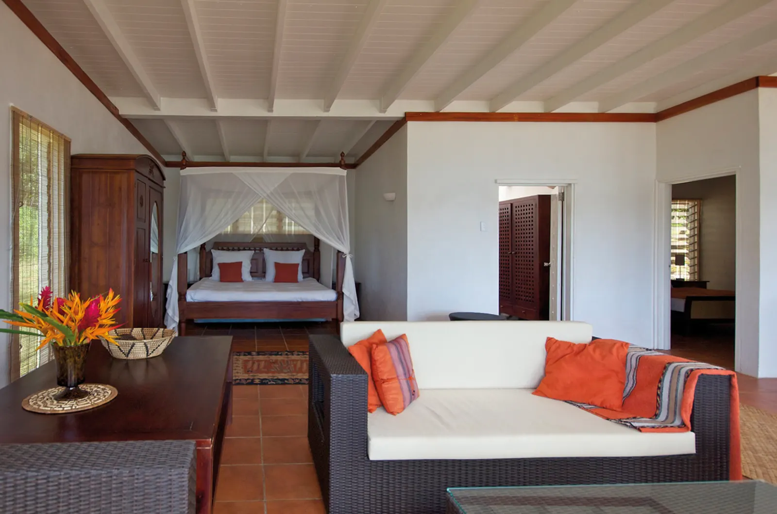 Honeymoon Villa — four-poster bedroom and sitting area