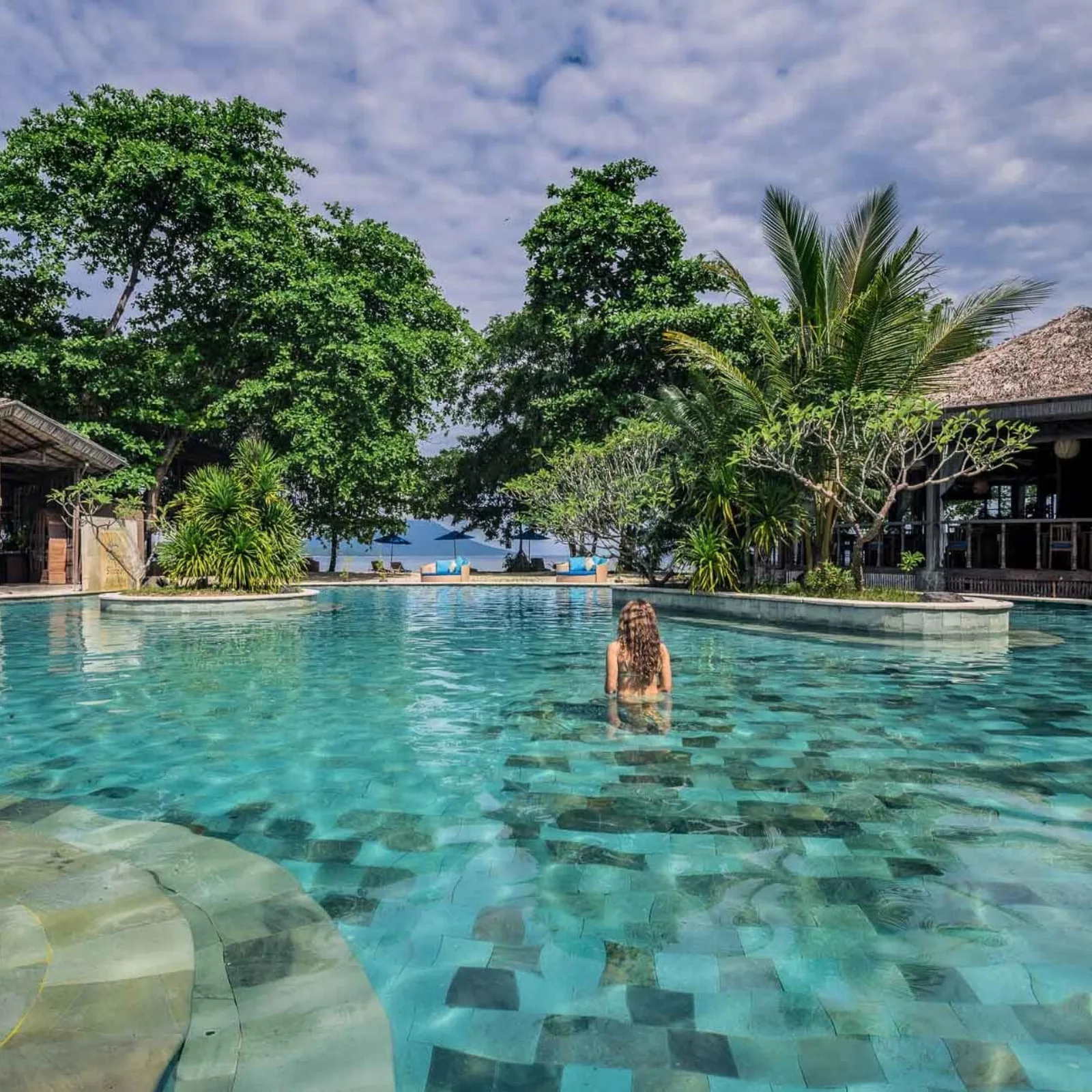 The pool and the thatched restaurant