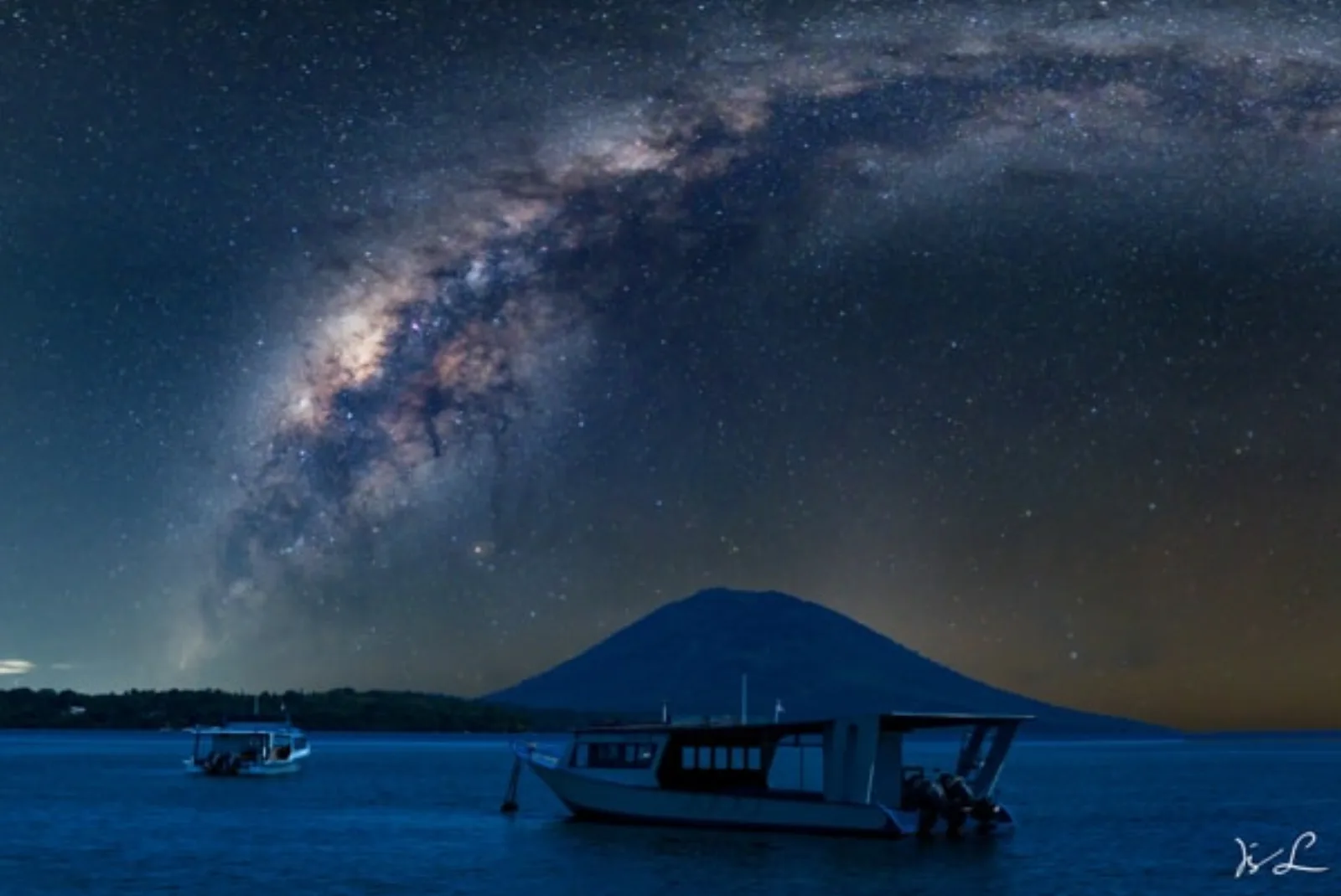 The Milky Way over the Manado Tua volcano