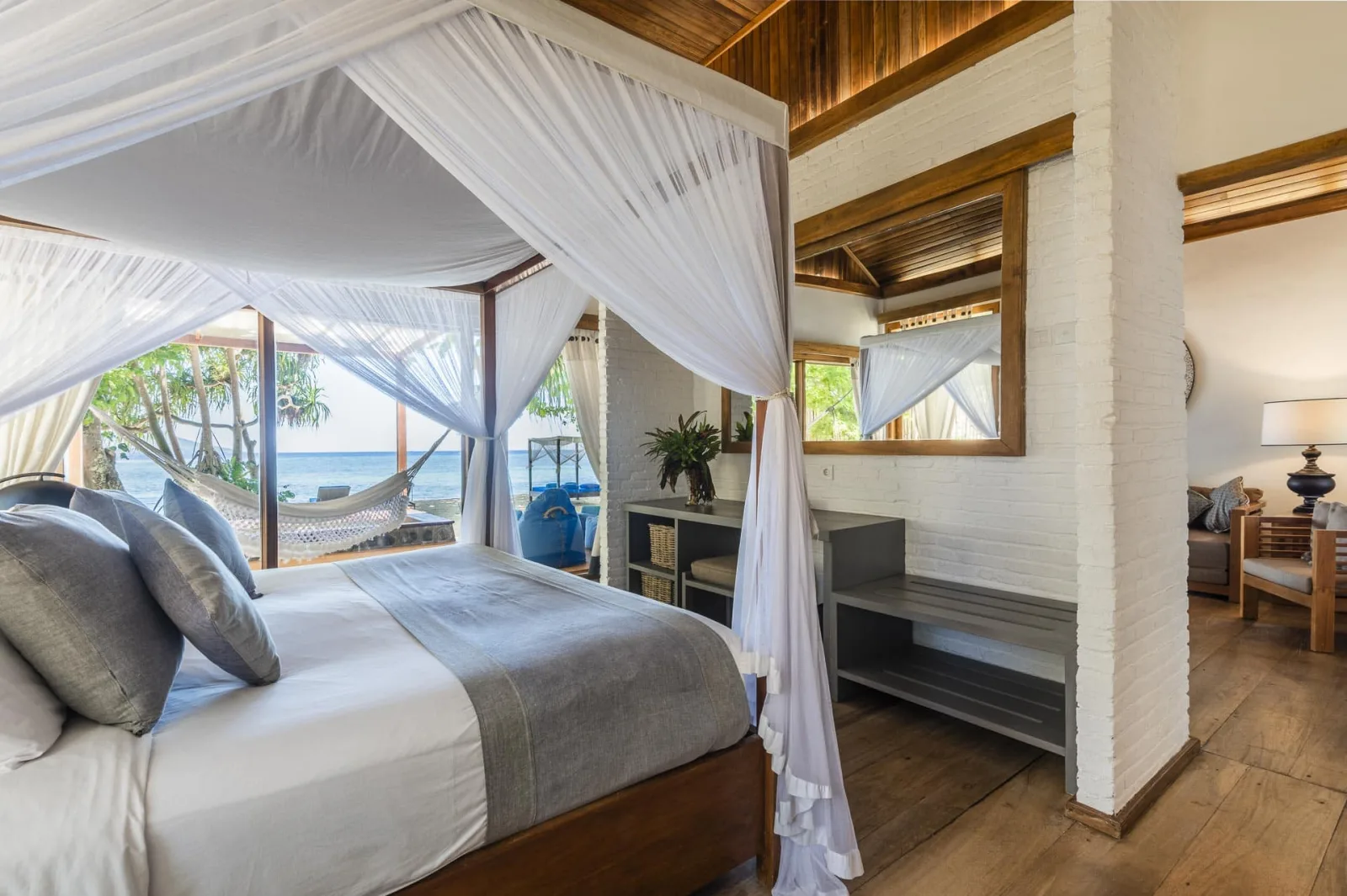 Bedroom with a draped four-poster bed
