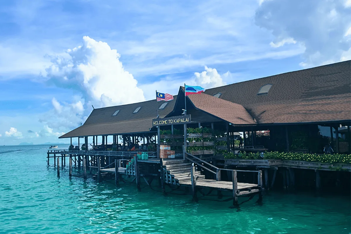 Main resort building on stilts above the sandbank
