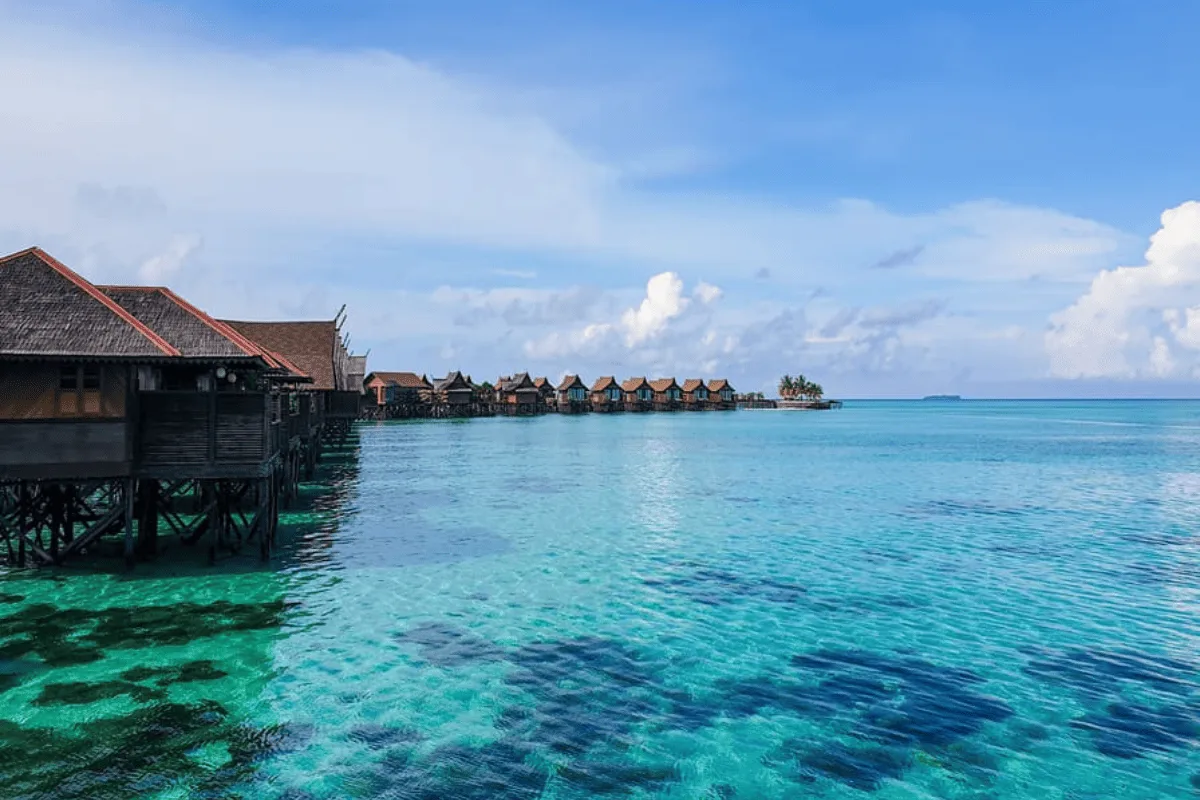 Chalets above turquoise shallows