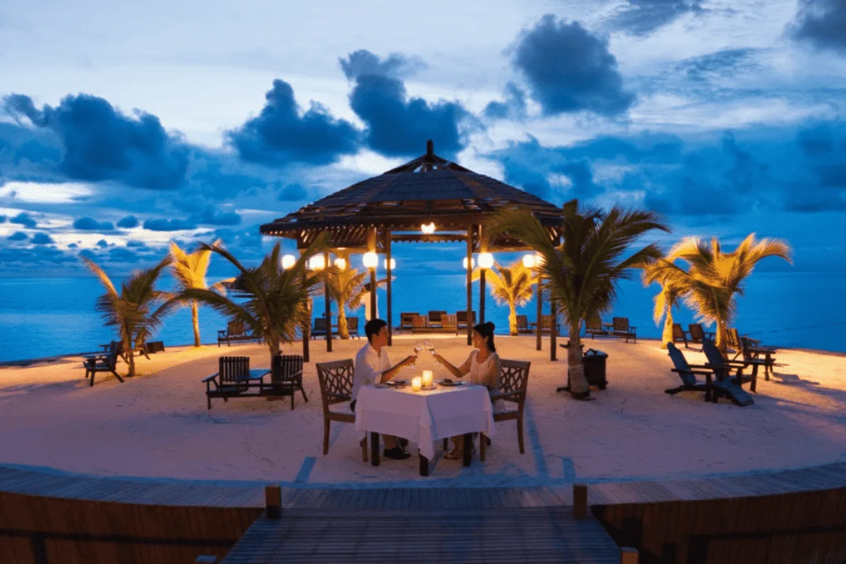 Dinner laid out on the deck by the water