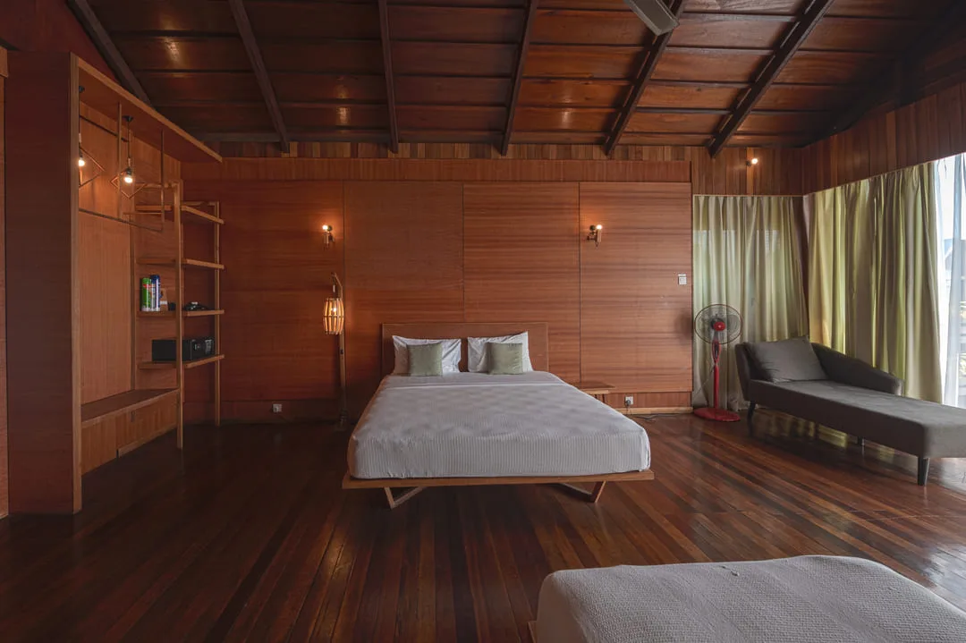 Bedroom with a high timber ceiling