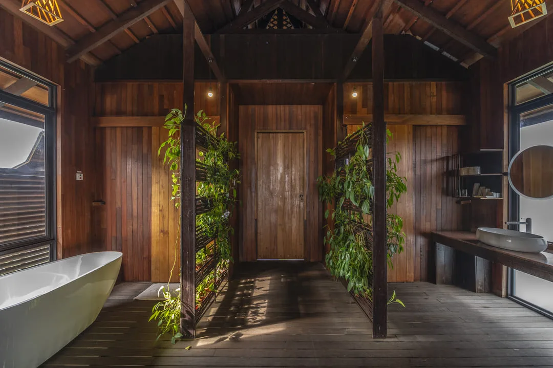 Half-open bathroom with a tub