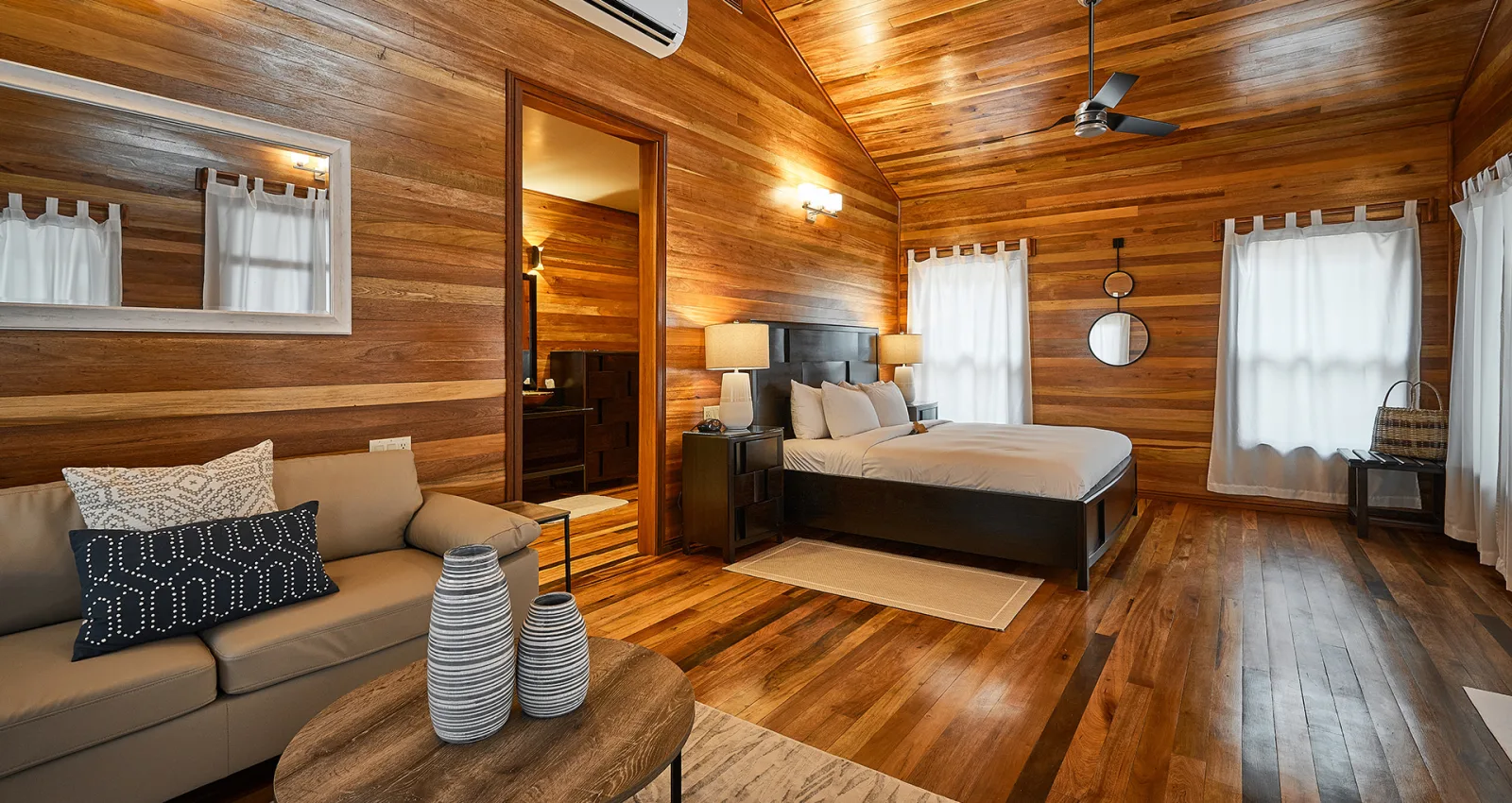 Villa interior with a sofa and bed