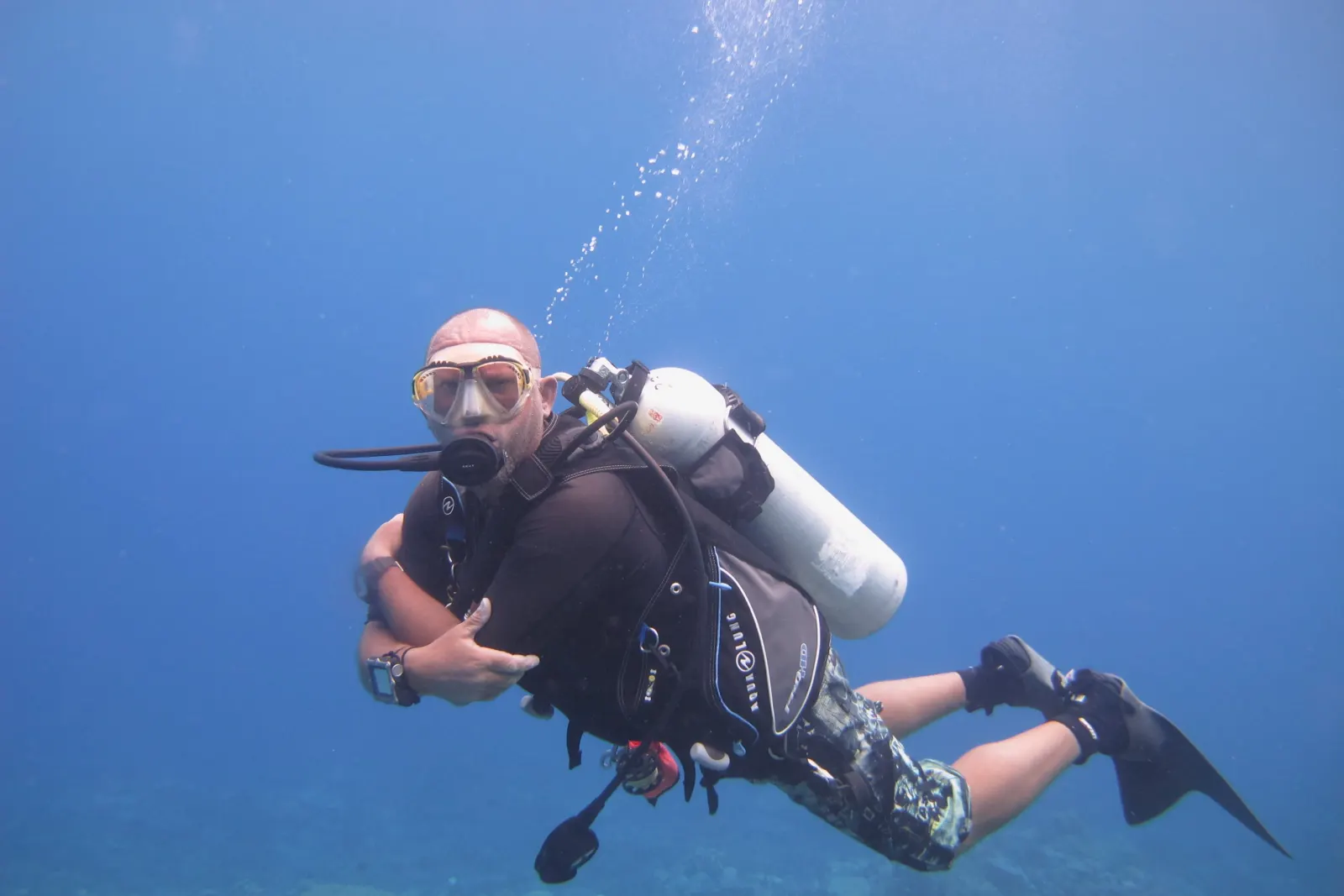 Diver over the reef