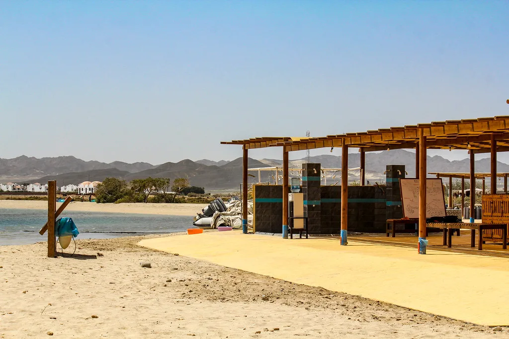 The kite station on the shore of the bay