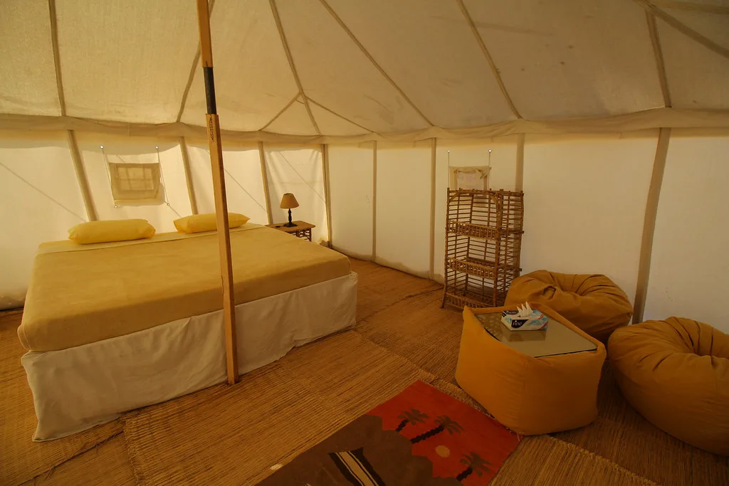 A tent with bean bag chairs