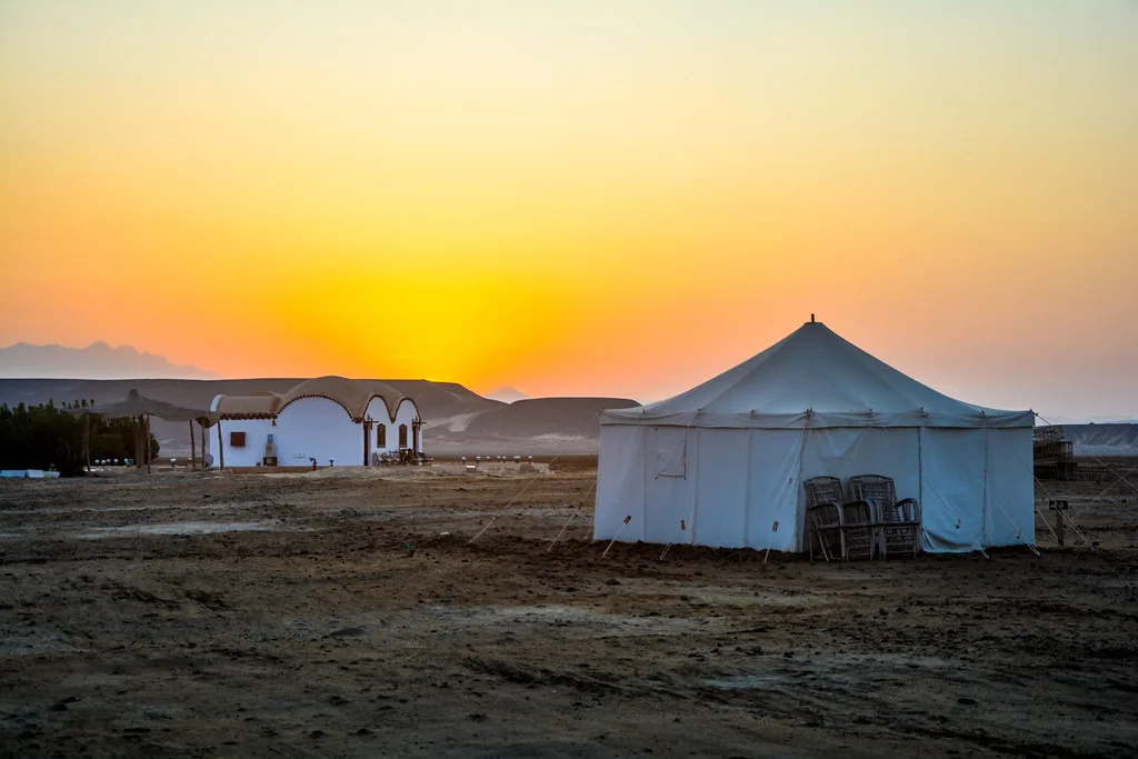A tent at sunset